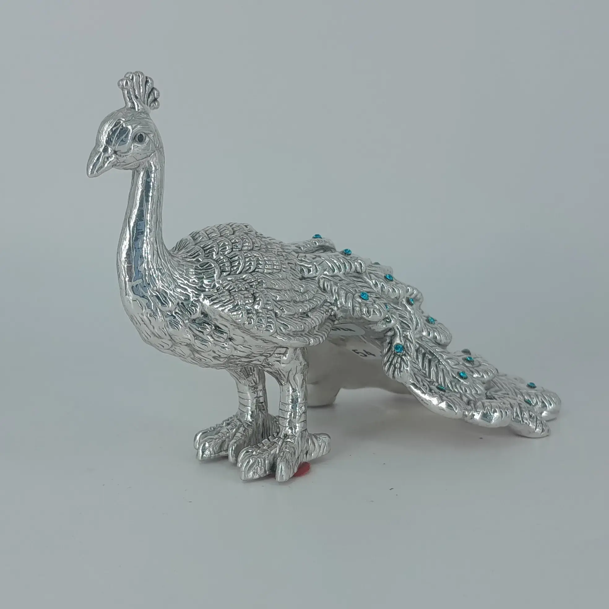 999 Silver Peacock